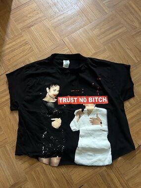 Classic Black Graphic Tee with Red and Cream Print